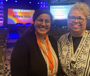 Two women attending a conference